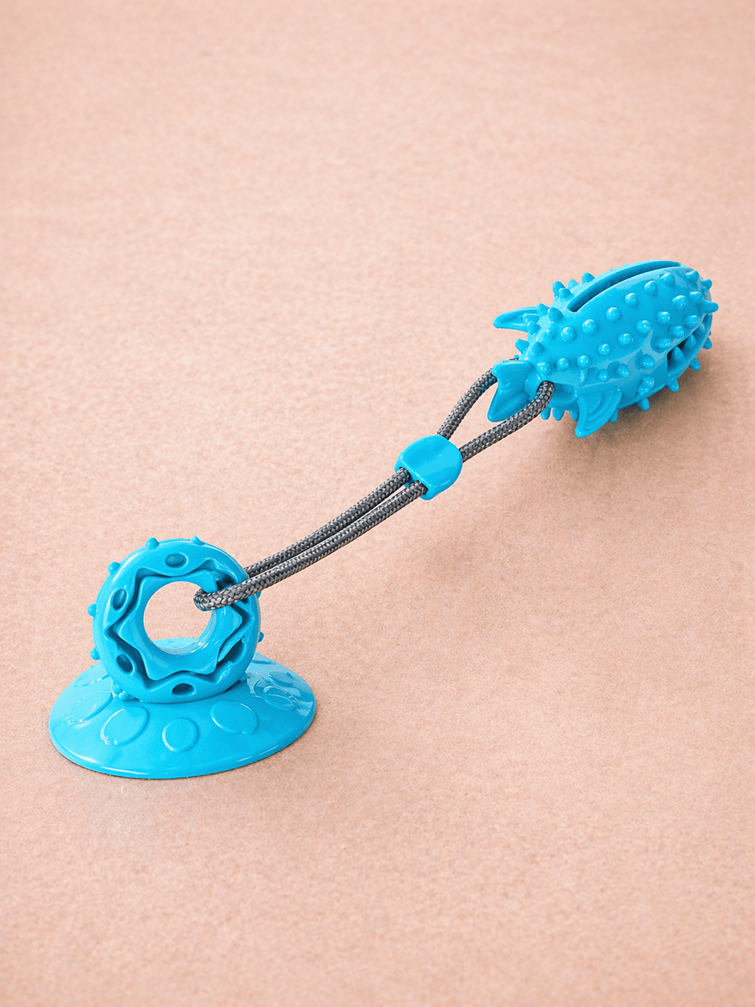 Suction cup tug toy in use