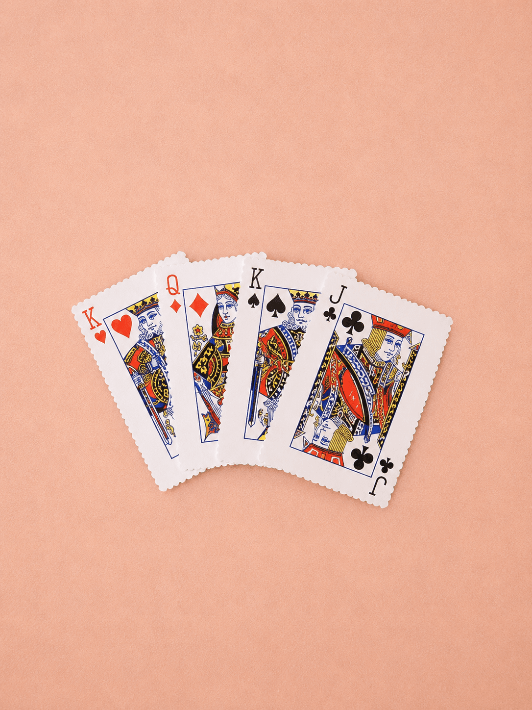 Squeaky playing card plush dog toy