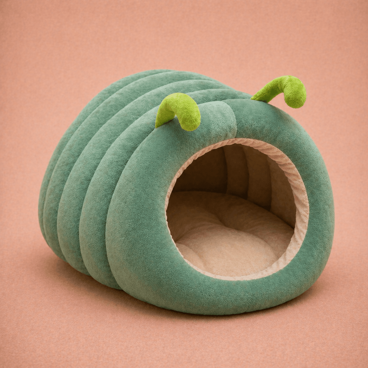 Teal pumpkin-shaped velvet cave dog bed