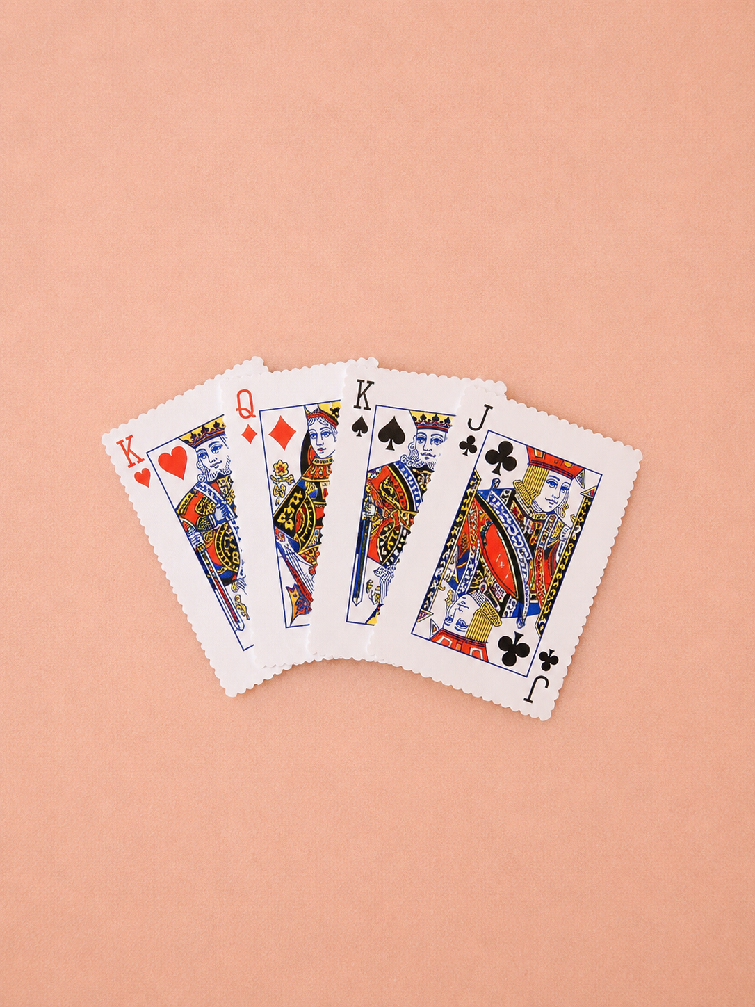 Squeaky playing card plush dog toy