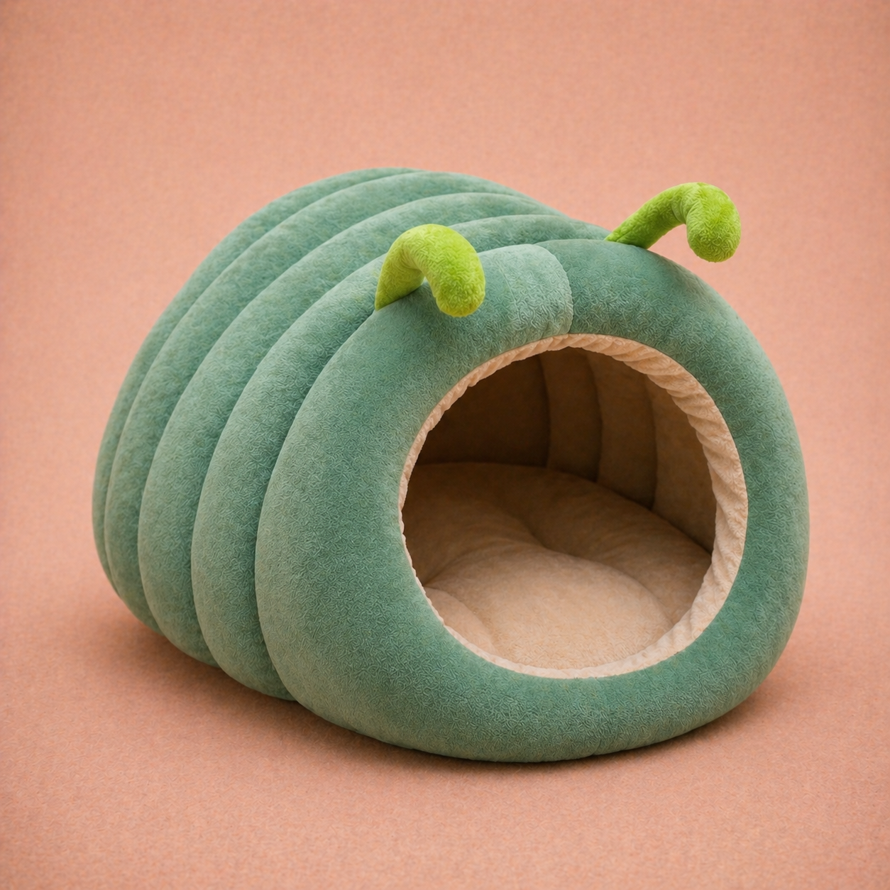 Teal pumpkin-shaped velvet cave dog bed
